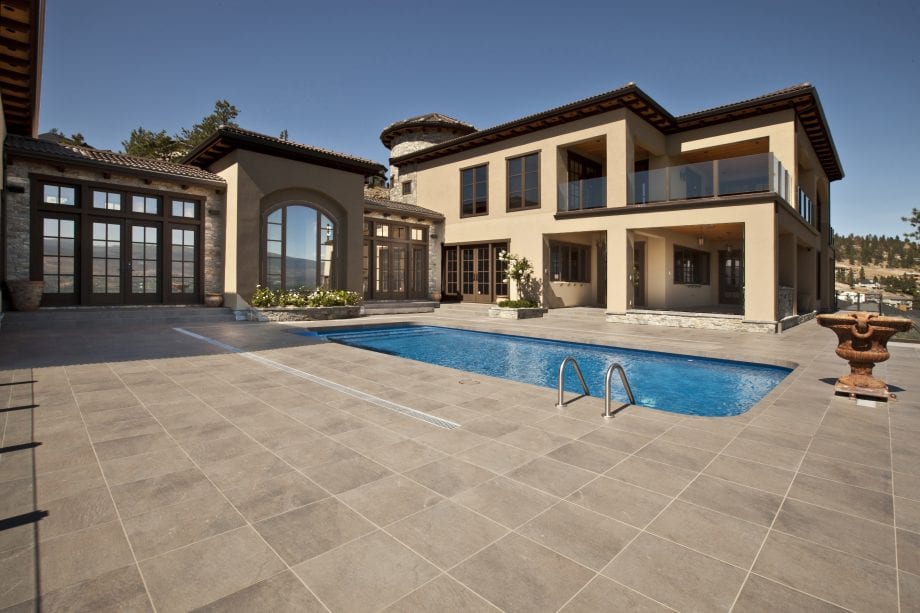 Home with luxury swimming pool and pool deck