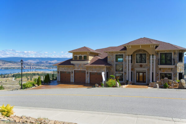 Street view of 1903 Scott Crescent, a luxury West Kelowna home with a lake view.